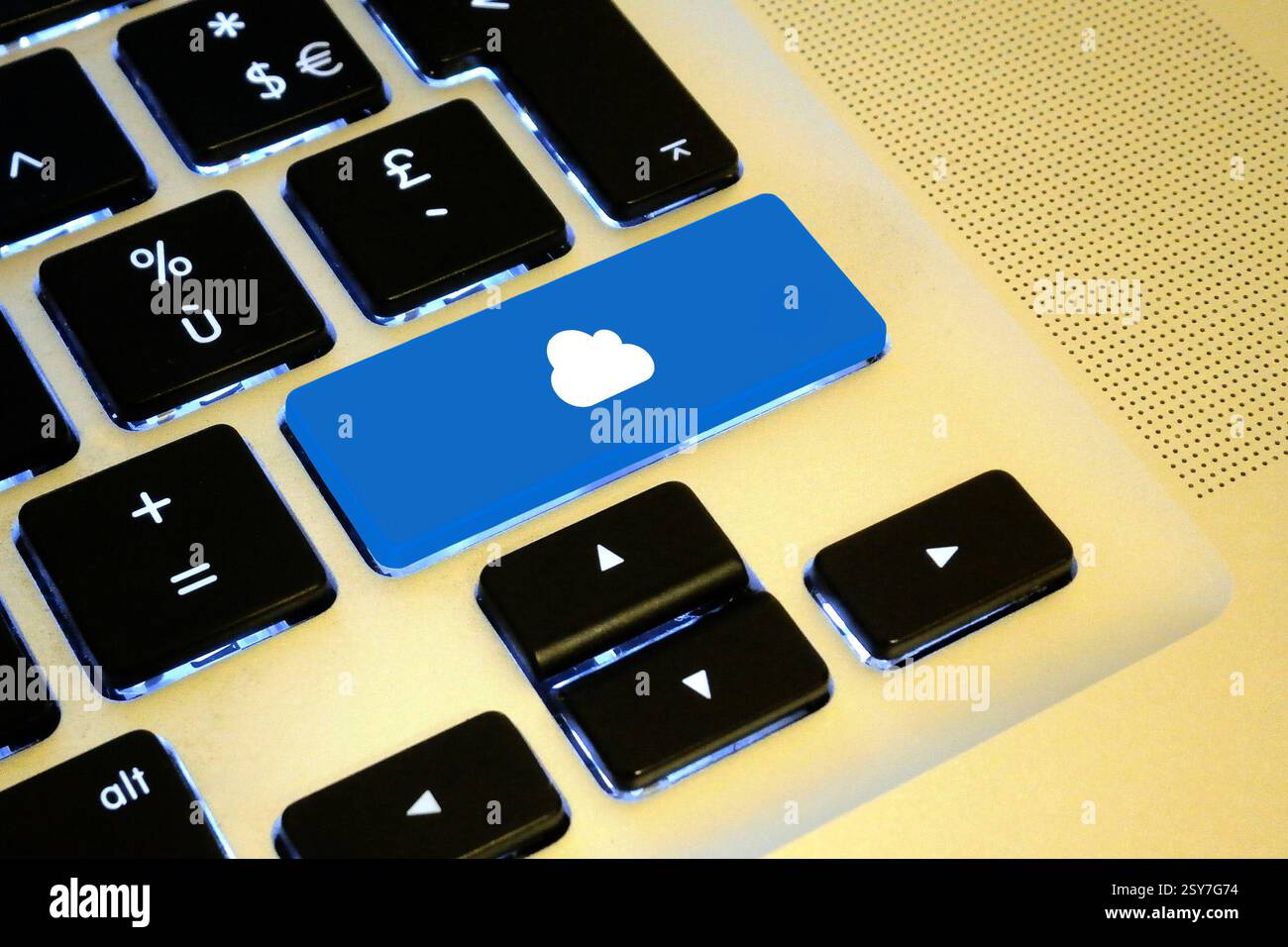 Close up on a blue key with a white cloud on it. Stock Photo