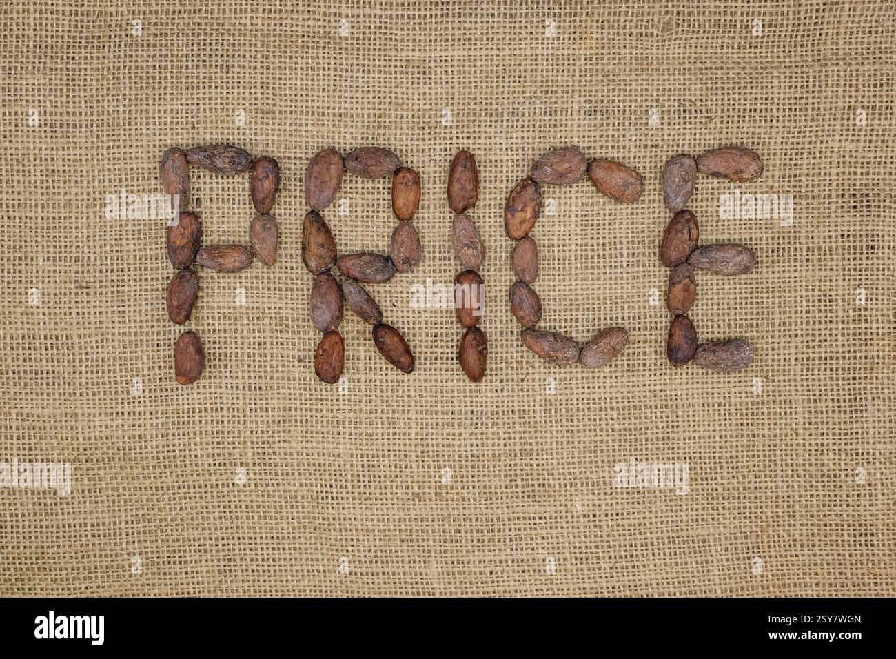 Cocoa beans. The word price is made from cocoa beans on a jute