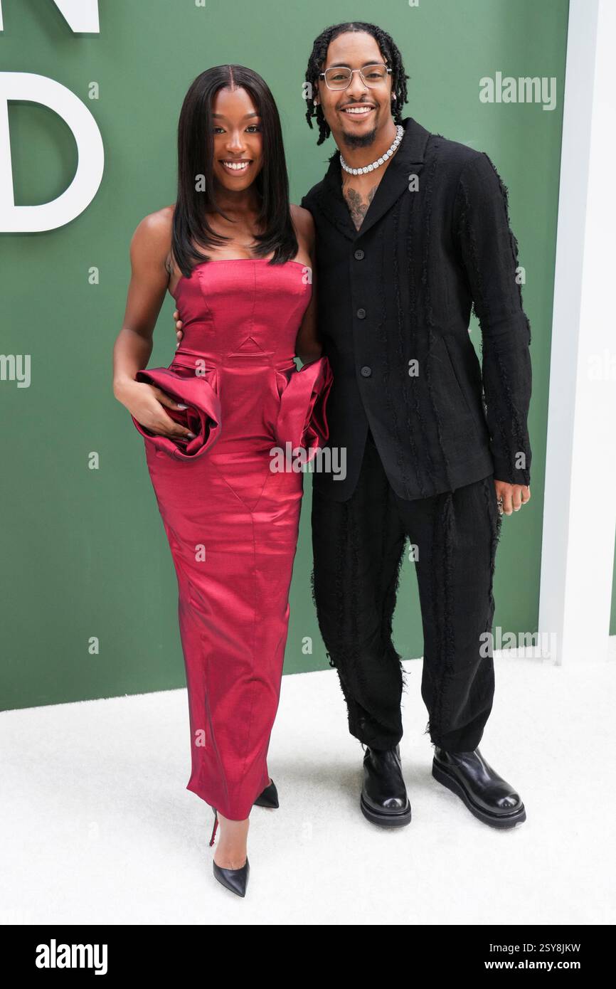 Serena Page, left, and Kordell Beckham arrive at the Essence Black