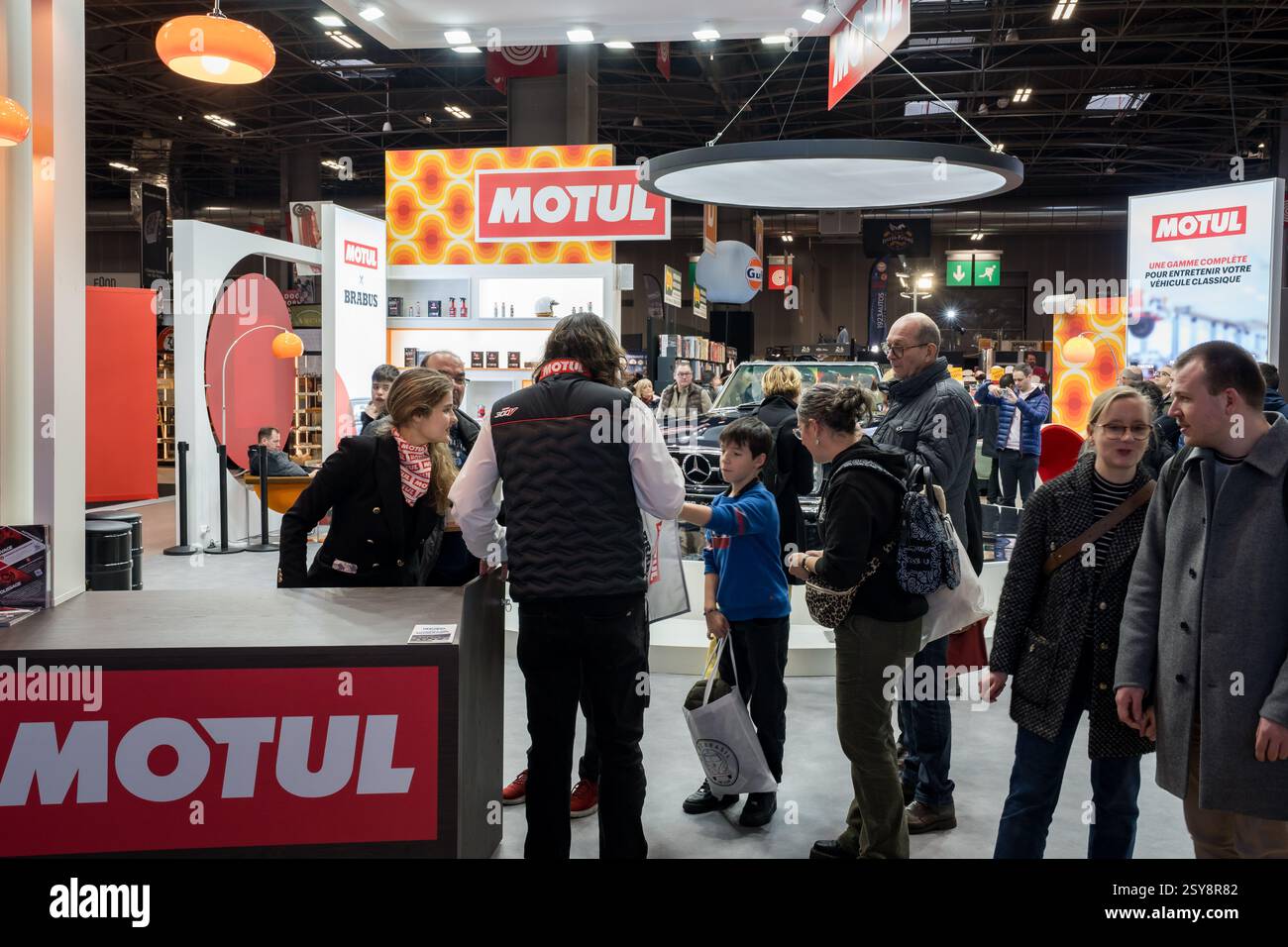 Bustling exhibition booth hi-res stock photography and images - Alamy