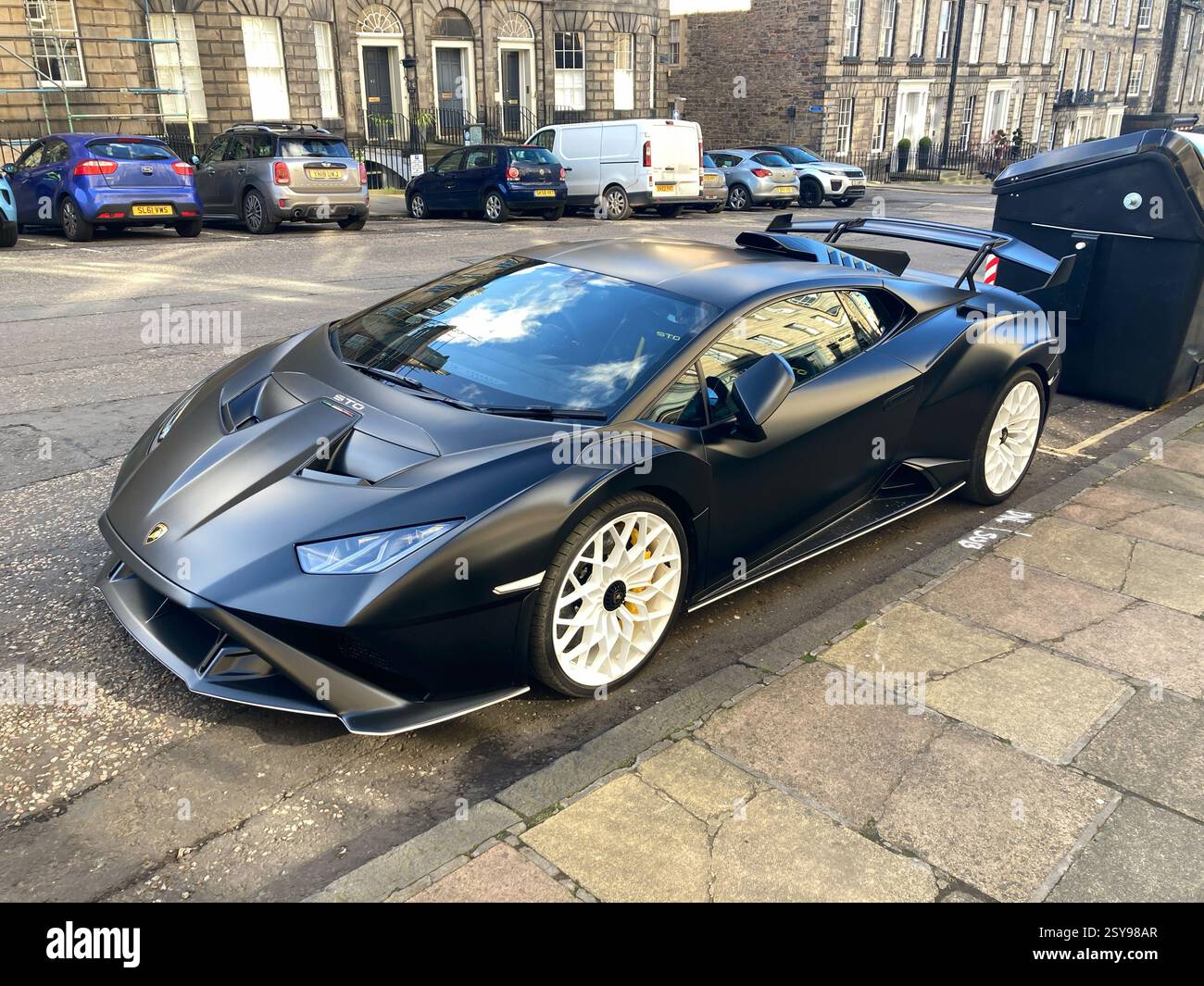 Lamborghini Huracán STO with black bodywork parked up in street, Edinburgh - Smartphone Captured Stock Image