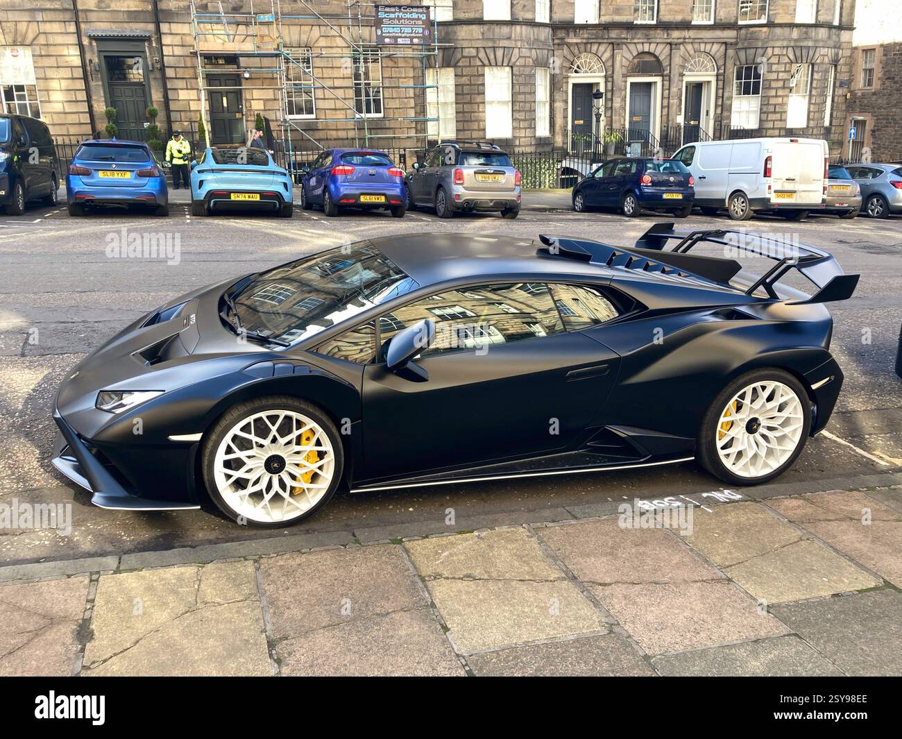 Lamborghini Huracán STO with black bodywork parked up in street, Edinburgh - Smartphone Captured Stock Image