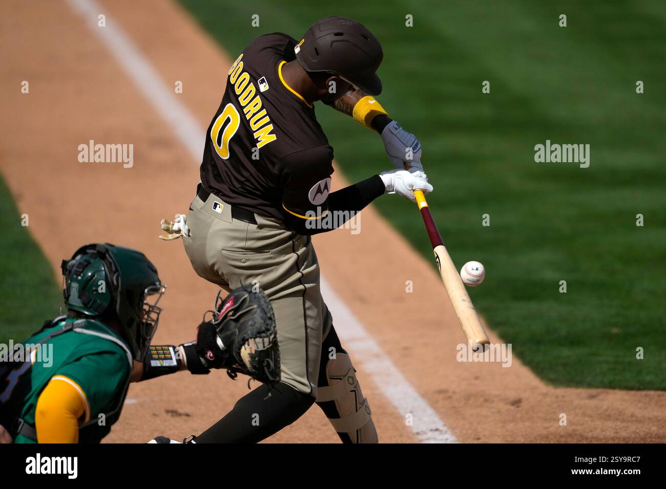 San Diego Padres' Niko Goodrum hits against the Athletics during a ...