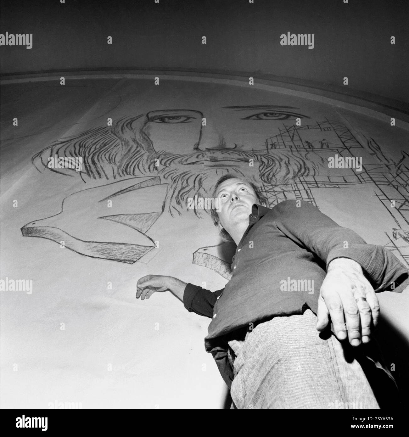 Romanian artist Mihu Vulcanescu (1937- 1994) working on a mural inside ...