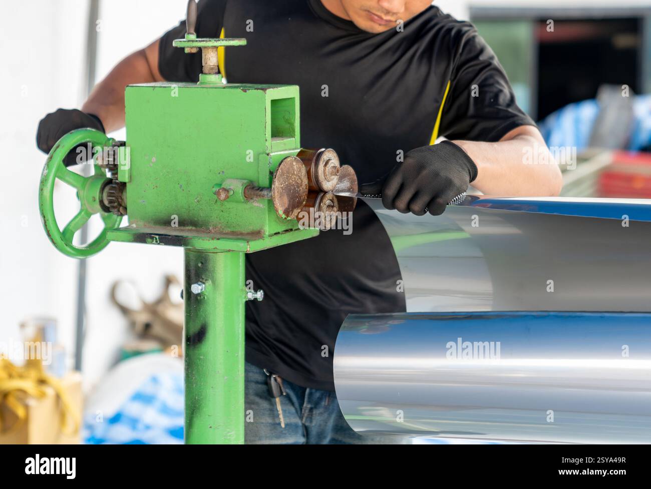 Metal bending on processing equipment hi-res stock photography and ...