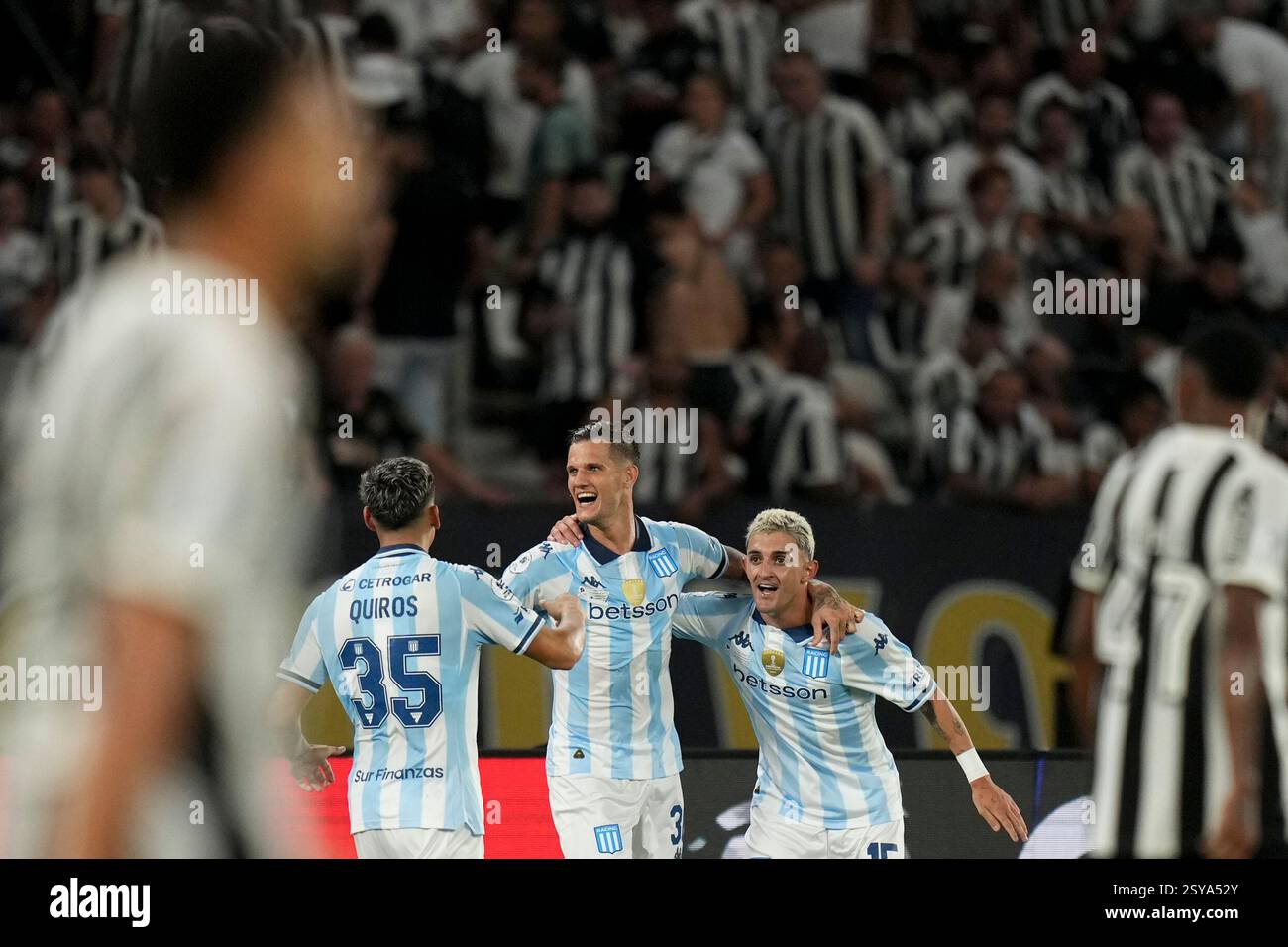 Zucullini Racing Bruno Zuculini of Argentina's Racing Club, center, celebrates scoring ...