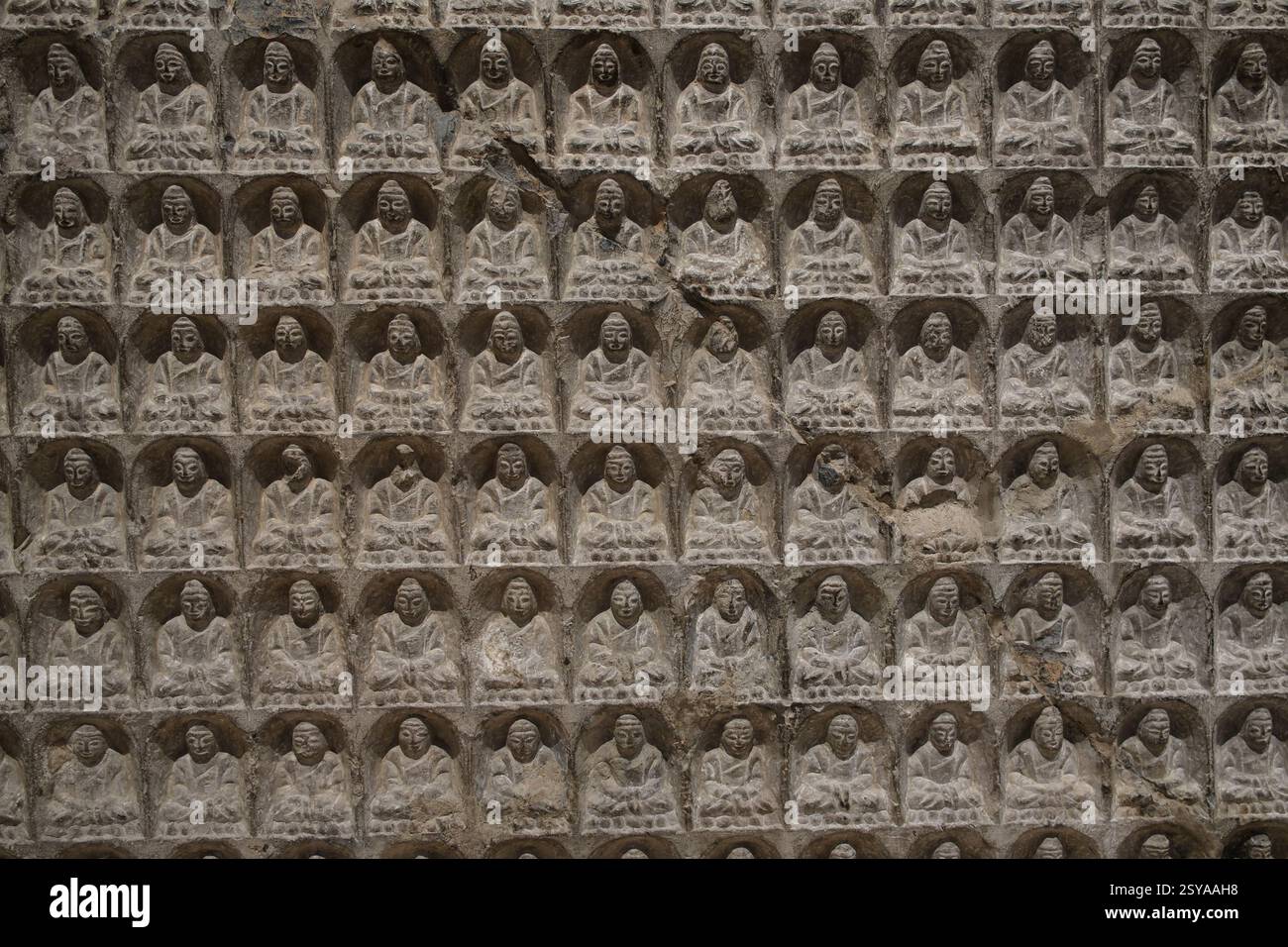Shanghai,China-March 17th 2024: Thousand buddha votive stele. ancient Buddhism votive stele Stock Photo