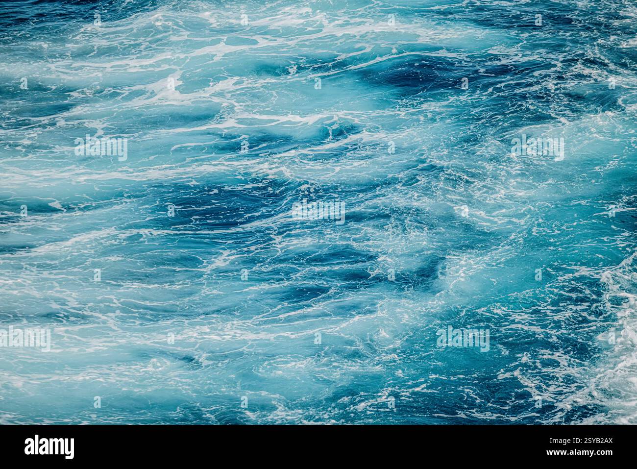 Calm water surface with soft ripples and shades of blue. A peaceful and ...