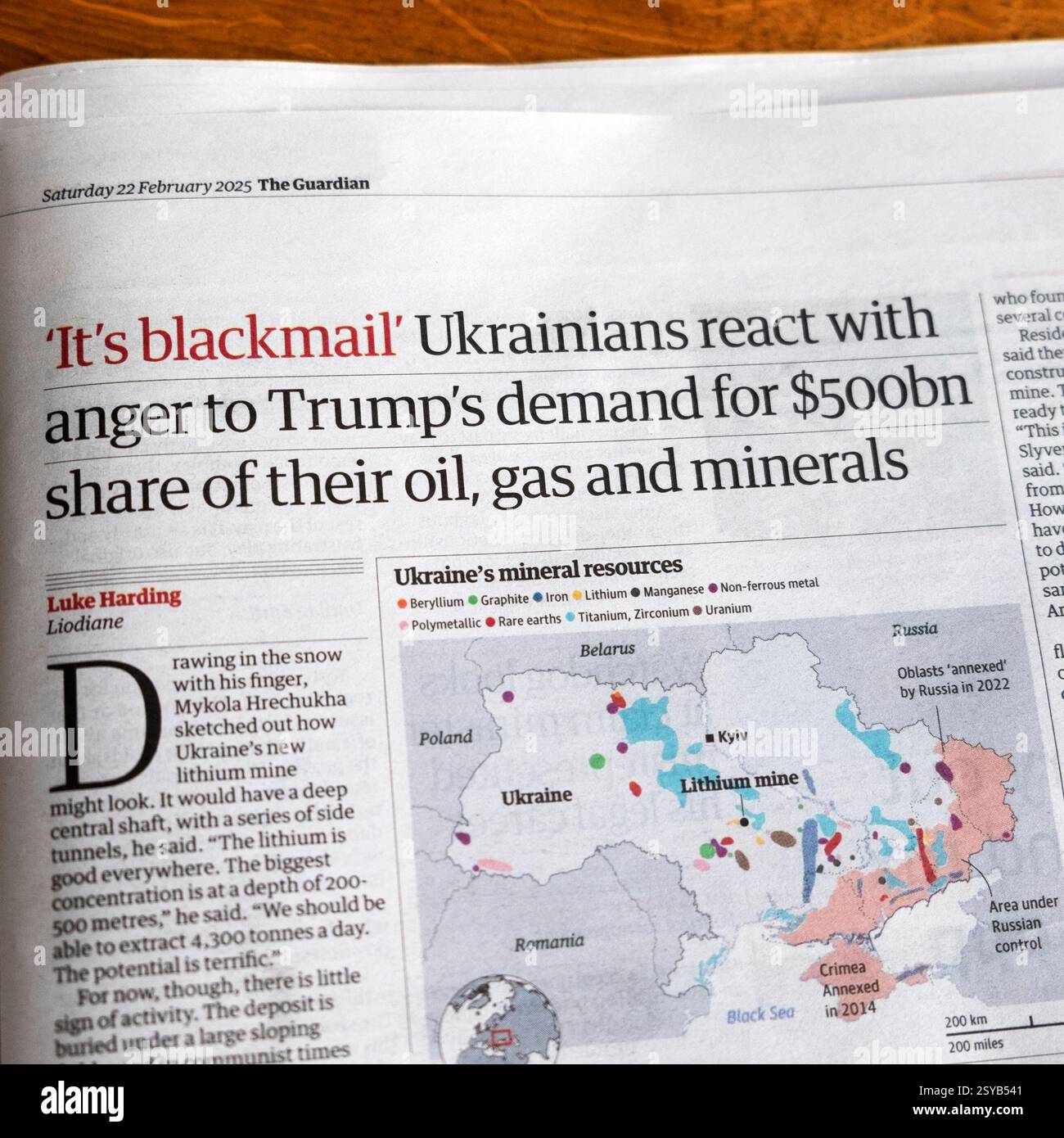 'It's blackmail' Ukrainians react with anger to Trump 's demand for $500bn share of their oil, gas and minerals' Guardian newspaper headline 2025 UK Stock Photo