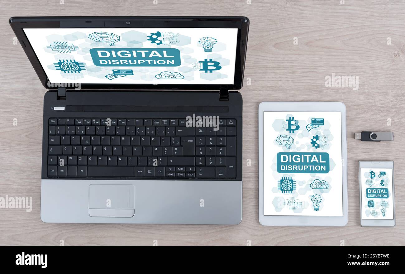 Digital disruption concept shown on different information technology devices Stock Photo