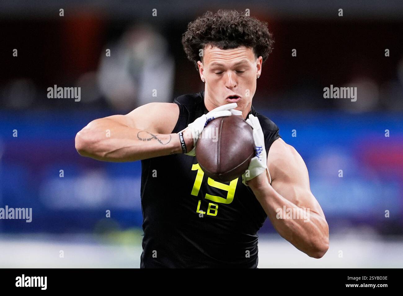 UCLA linebacker Kain Medrano runs a drill at the NFL football scouting ...