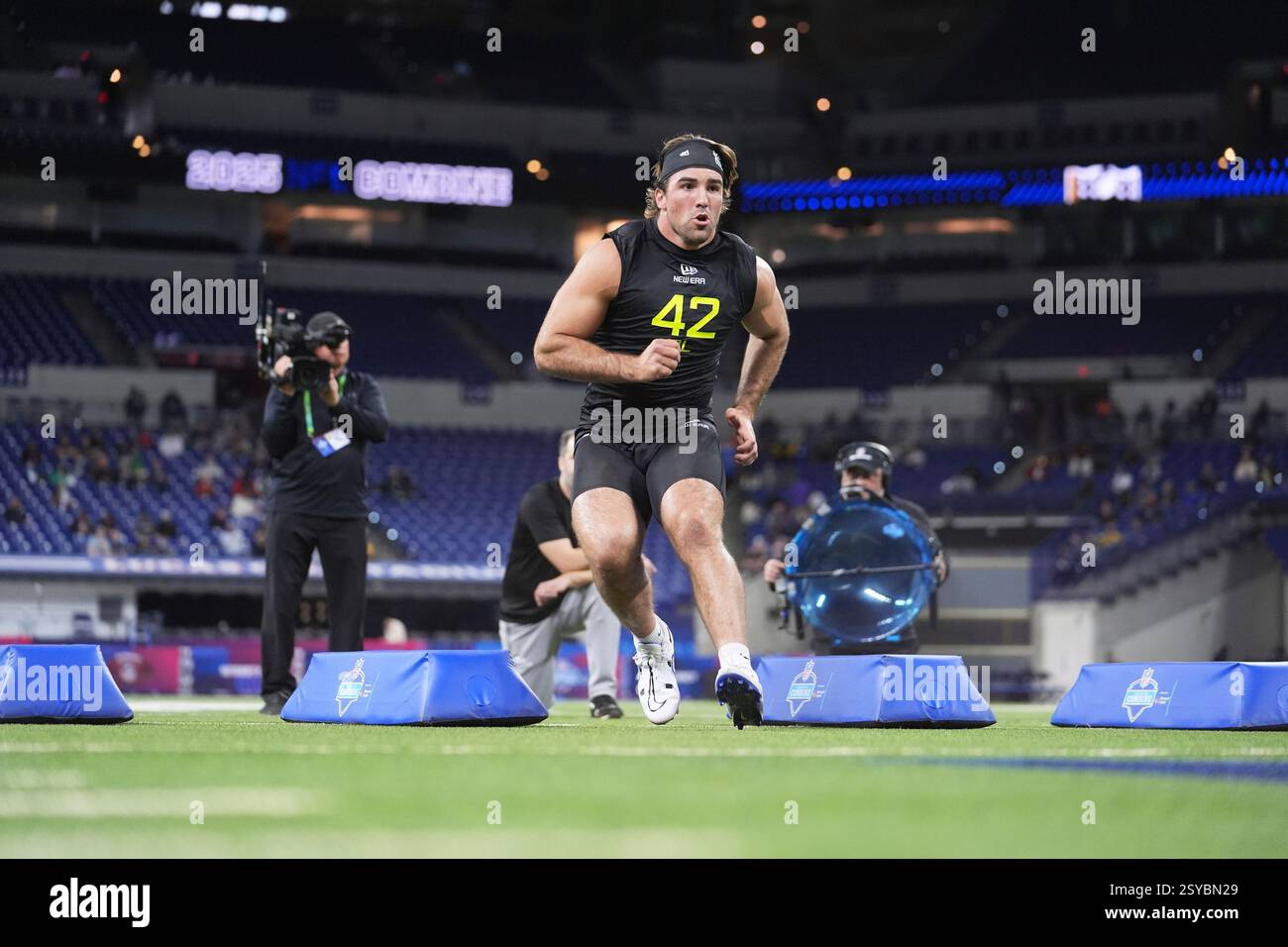 Tyler Baty BYU defensive lineman Tyler Batty runs a drill at the NFL football ...