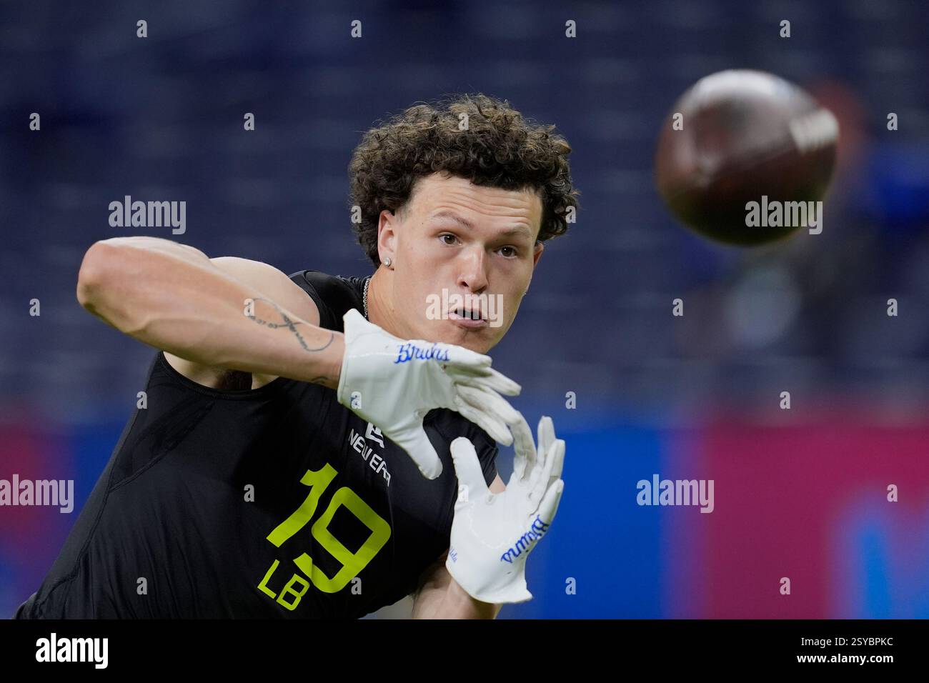 UCLA linebacker Kain Medrano runs a drill at the NFL football scouting ...