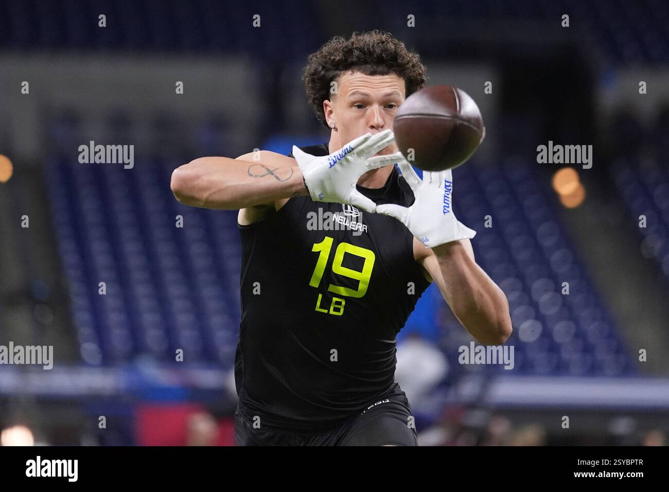 UCLA linebacker Kain Medrano runs a drill at the NFL football scouting ...
