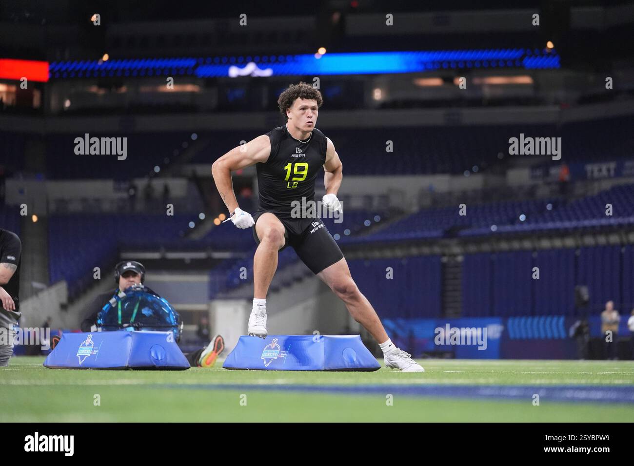 UCLA linebacker Kain Medrano runs a drill at the NFL football scouting ...
