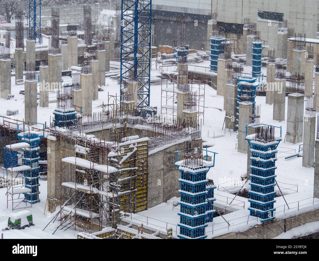 high-rise buildings under construction in a snowy environment Stock ...