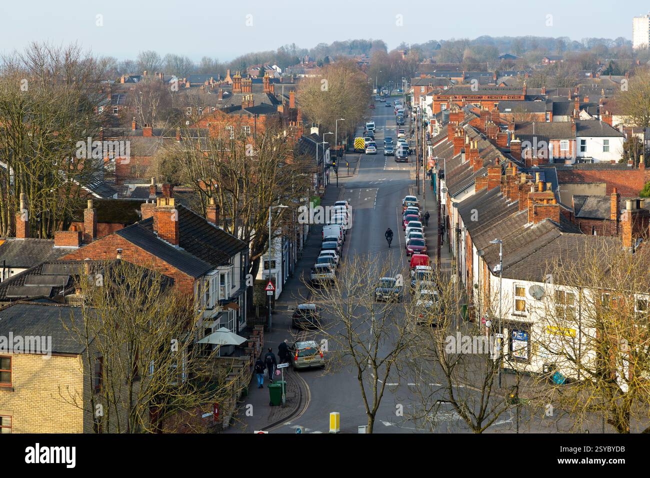 Cars parked in street of Victorian terraced housing, Burton Road, city ...