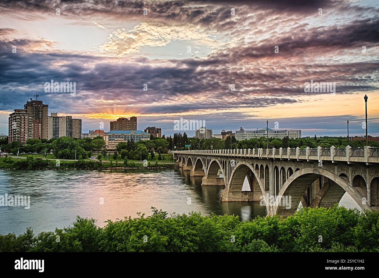 Cityscape of the city of Saskatoon in Western Canada along the South Saskatchewan River Stock Photo