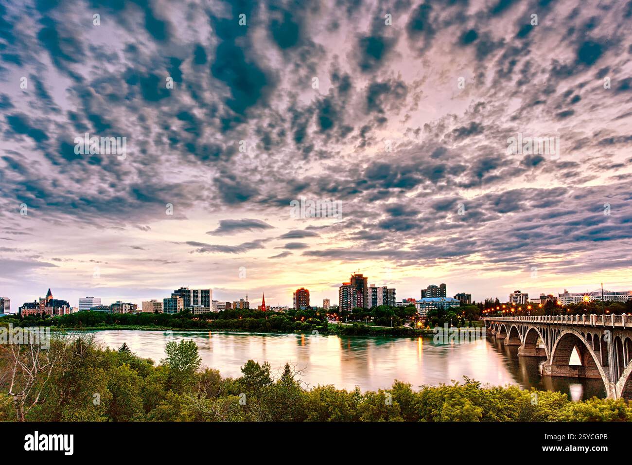 Cityscape of the city of Saskatoon in Western Canada along the South Saskatchewan River Stock Photo