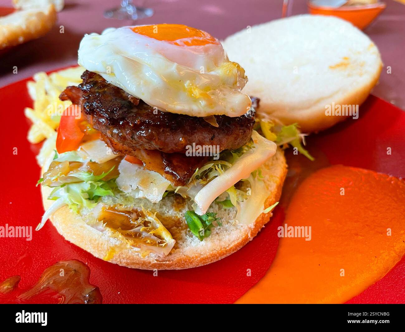 Hamburger with salad and fried egg. - Smartphone Captured Stock Image