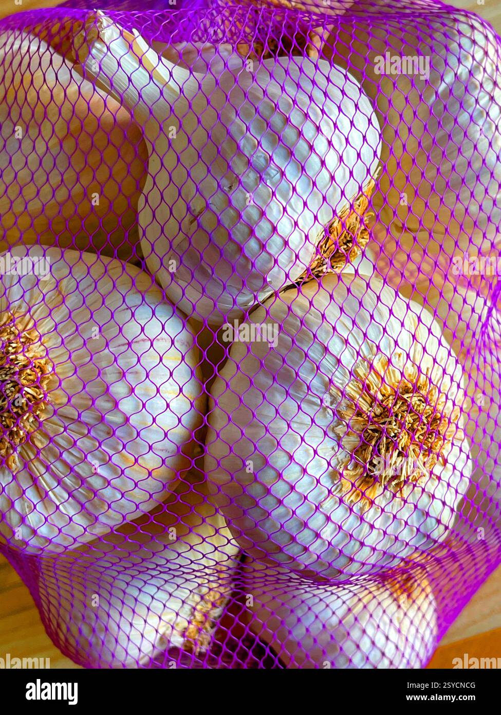 Garlics in net. - Smartphone Captured Stock Image