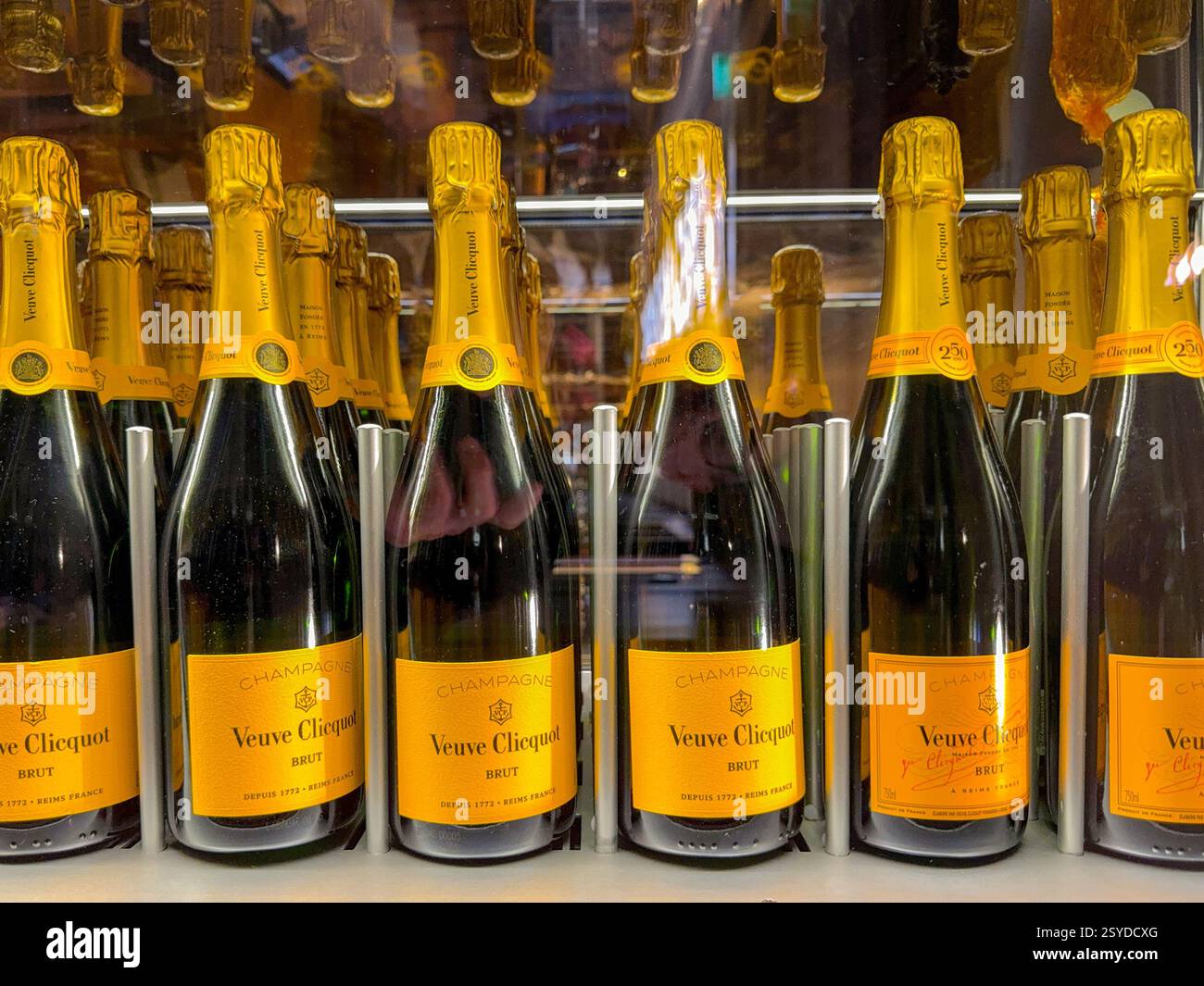 Miami, Florida, USA - 4 January 2025: Bottles of Veuve Clicquot champagne in the chiller cabinet of a wine bar - Smartphone Captured Stock Image