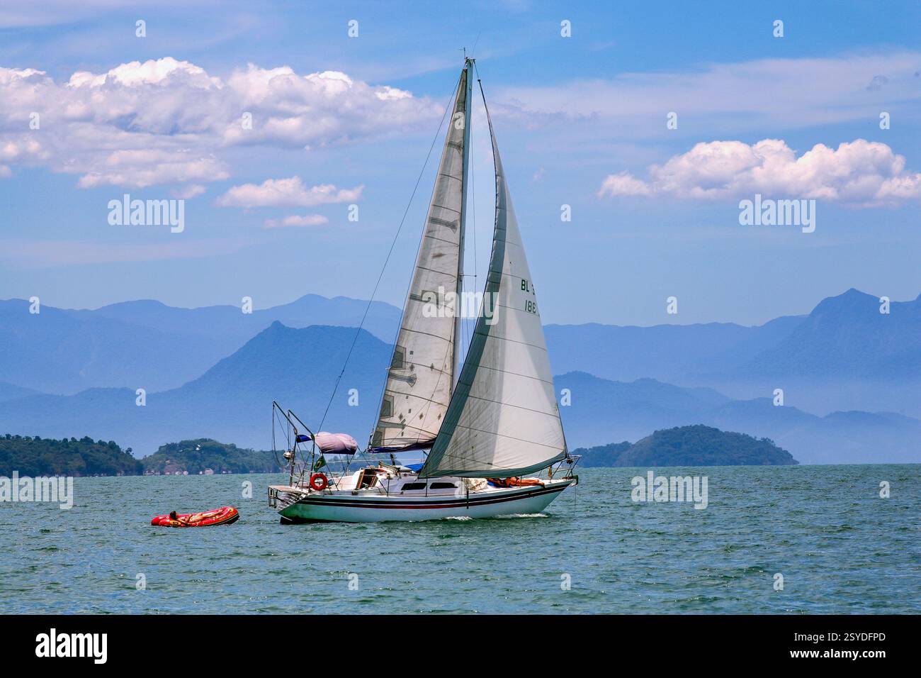 Brazil, sailing near the coast of the Costa Verde, south of Rio de Janeiro with hundreds of exotic islands. Stock Photo