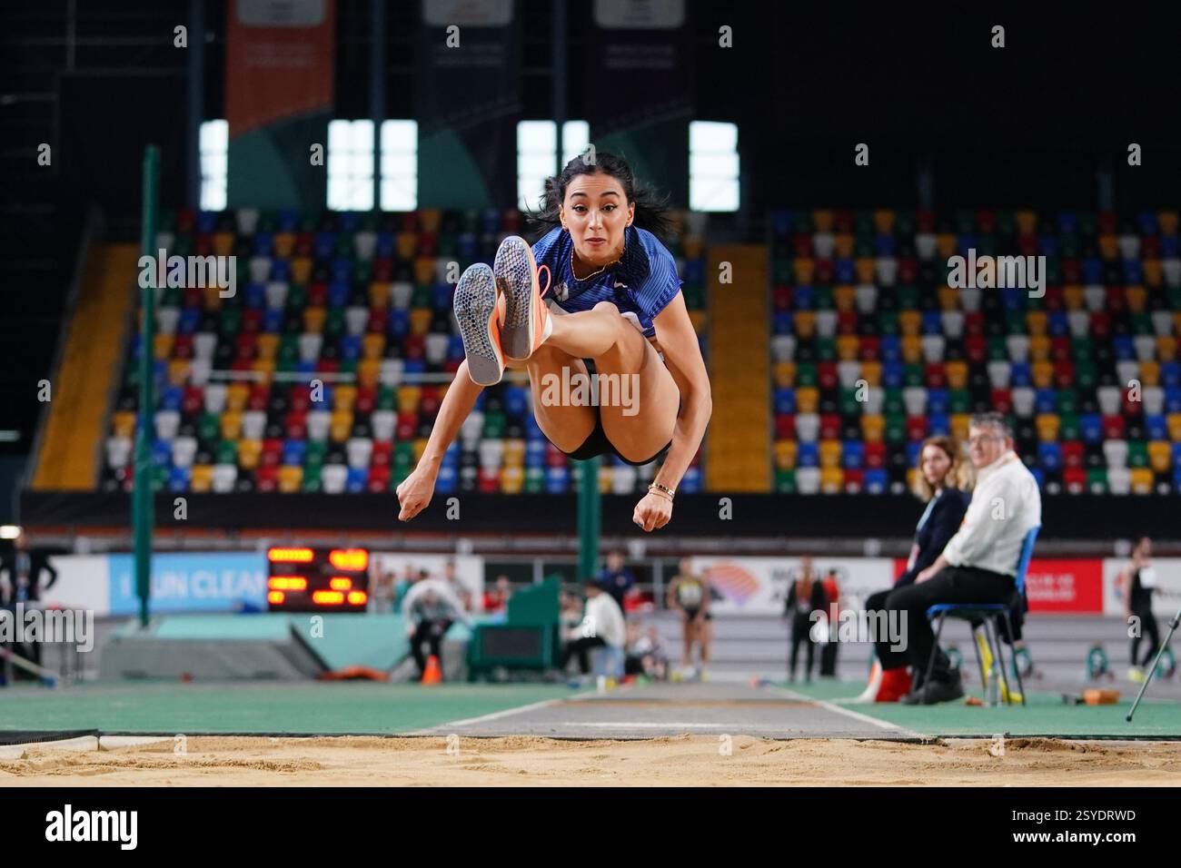 ISTANBUL, TURKIYE - JANUARY 18, 2025: Undefined athlete triple jumping ...