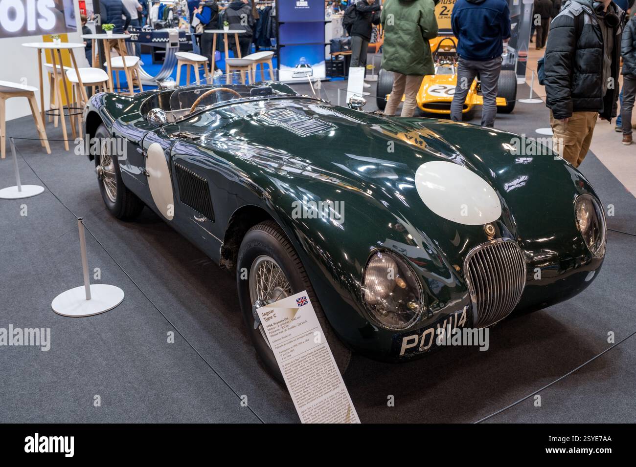 Classic racing car showcased at an automotive exhibition featuring ...