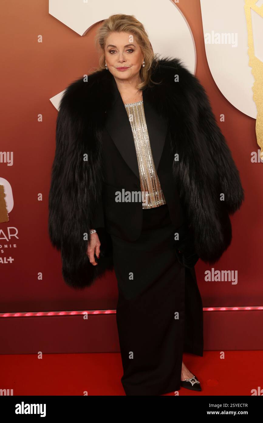 Catherine Deneuve poses as she arrives at the 50th Cesar Awards ...