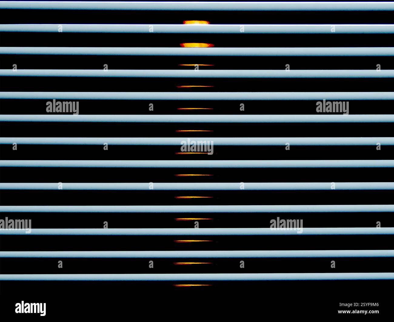 Venetian blinds with light and dark shadows closeup abstract Stock Photo