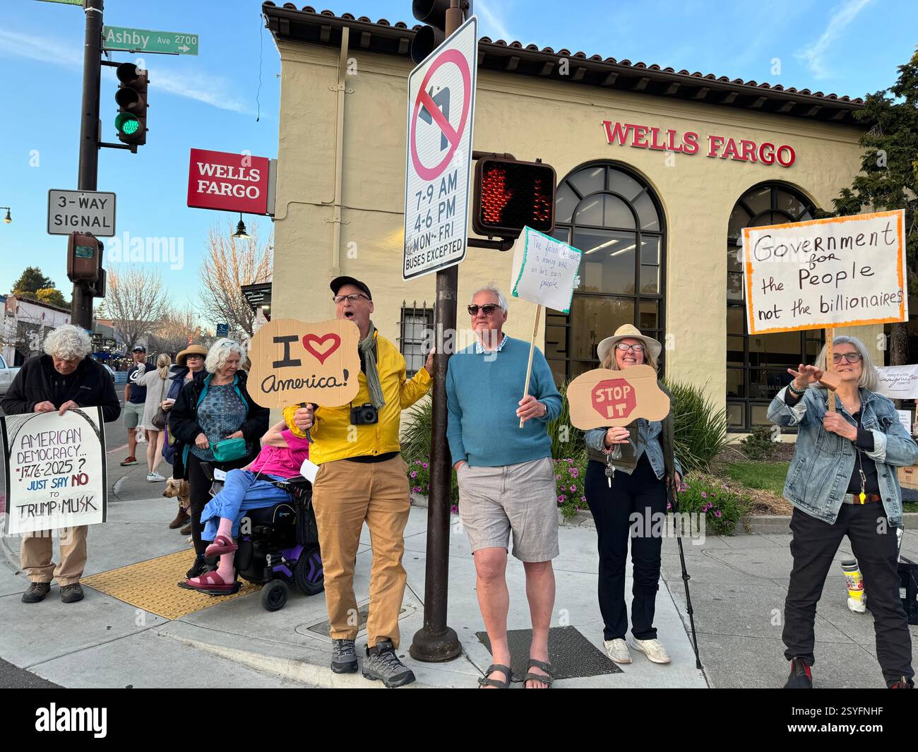 Americans protesting the Trump regime after his meeting with Zelensky on Friday, February 28, 2025 on the corner of Ashby and College Avenues in ... - Smartphone Captured Stock Image