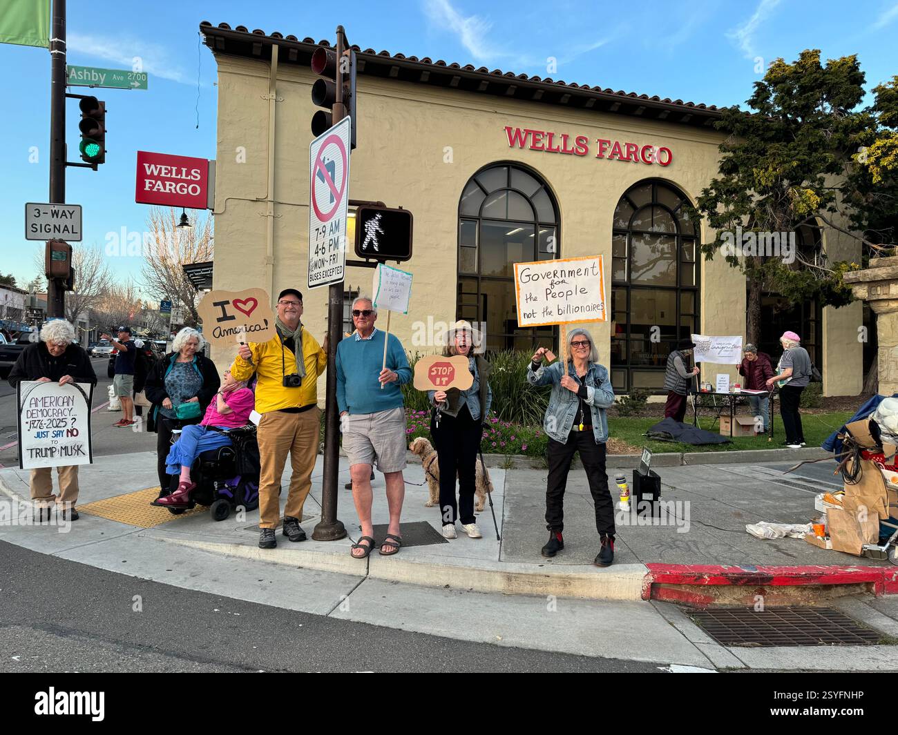 Americans protesting the Trump regime after his meeting with Zelensky on Friday, February 28, 2025 on the corner of Ashby and College Avenues in ... - Smartphone Captured Stock Image