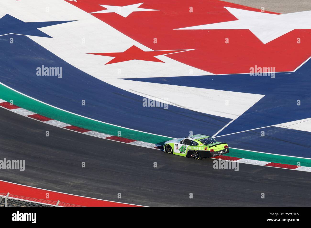 AUSTIN, TX - FEBRUARY 28: =41=speeds through turn three with the red ...