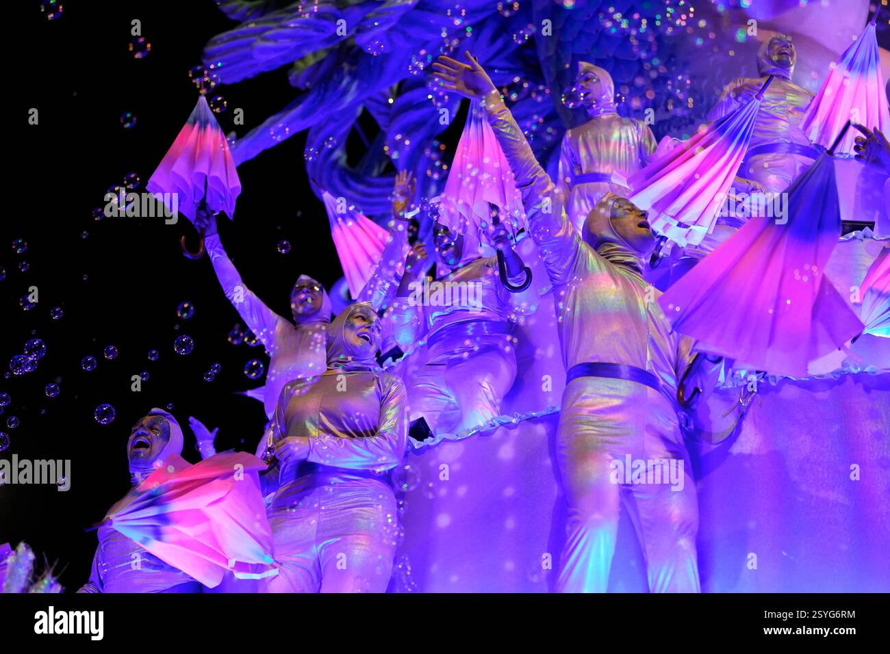 Dancers from the Colorado do Bras samba school perform on a float ...