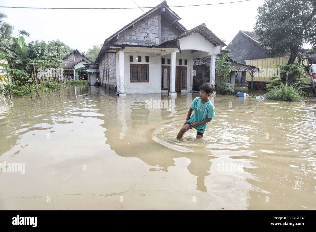 Boy wades hi-res stock photography and images - Alamy