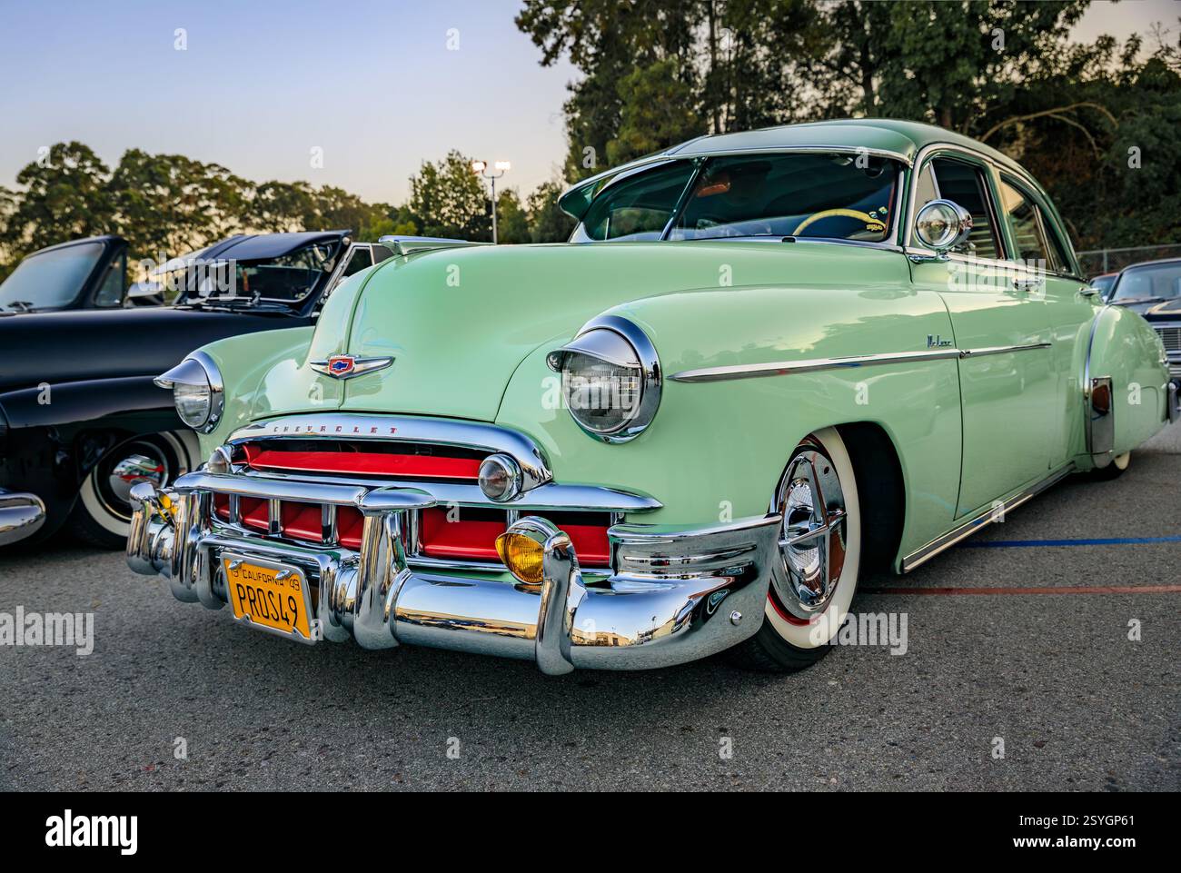 San Bruno, USA - October 7, 2022: Mint green 1949 Chevrolet Deluxe classic car at a car show, a chrome grille, whitewall tires and frenched headlights Stock Photo