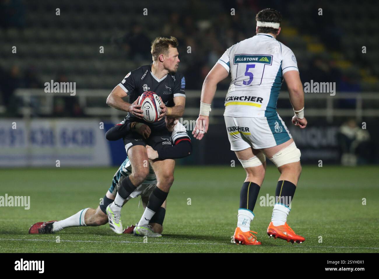 Sam Stuart Rugby Newcastle Falcon's Sam Stuart; is tackled during the Premiership Cup ...
