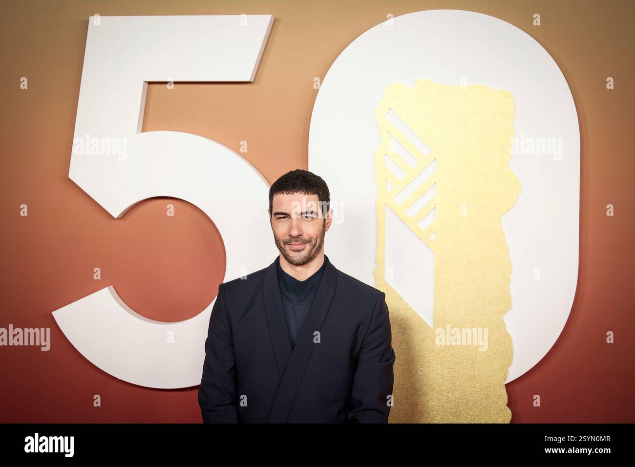 Tahar Rahim poses for photographers during the 50th Cesar Awards ...