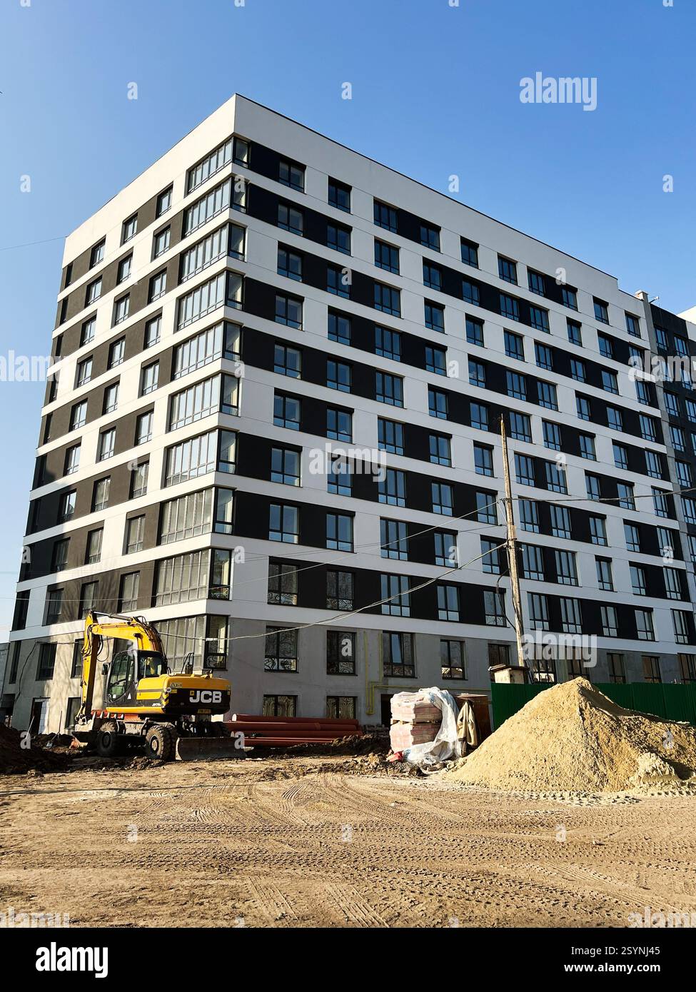 Klenovi Hai, Ukraine - February 27, 2025: Modern urban building under ...