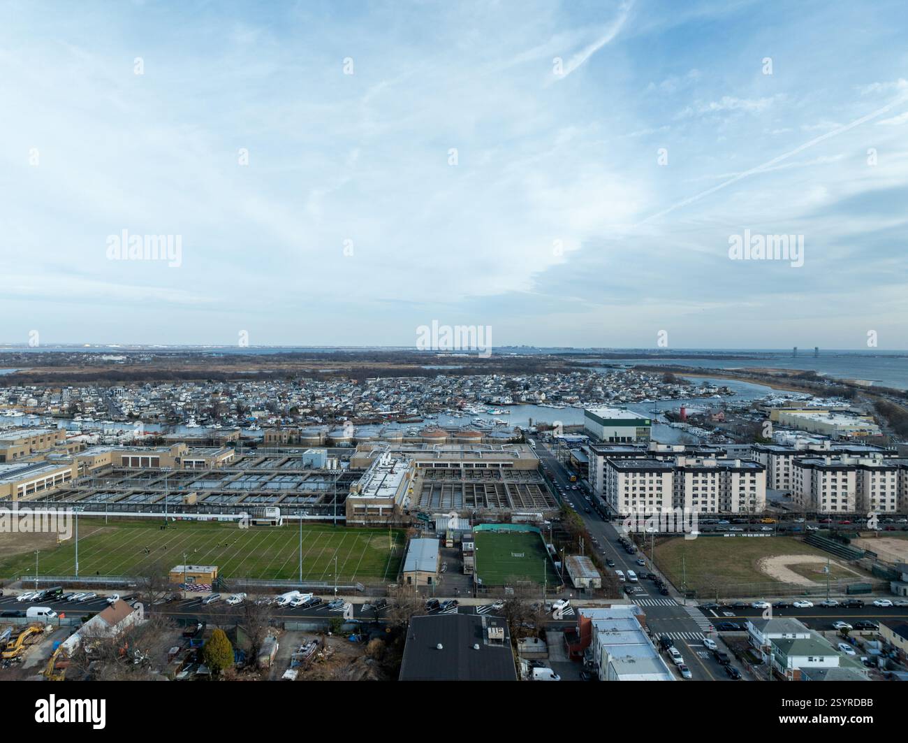 Aerial view of modern water cleaning facility at urban wastewater treatment plant. Purification process of removing undesirable chemicals, suspended s Stock Photo