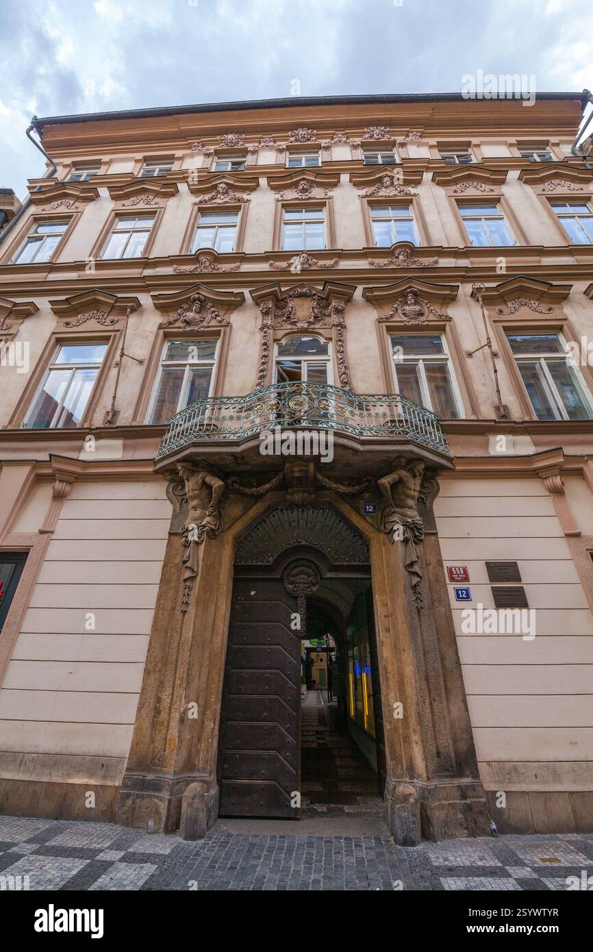 Low-angle shot of a grand, ornate building with a decorative facade ...