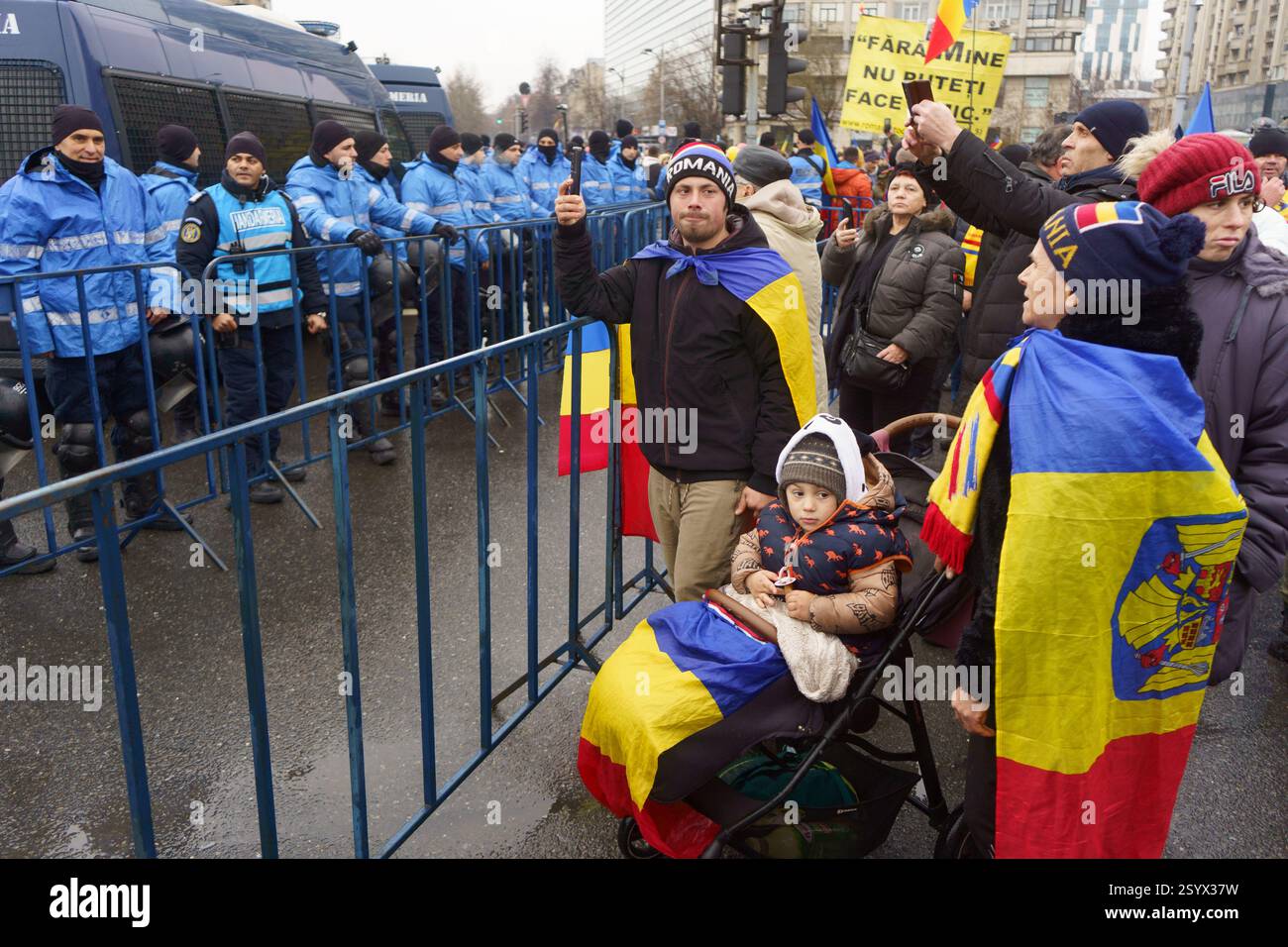 Bucharest, Romania. 1st Mar, 2025: People protest during the far-right Alliance for the Union of Romanians (AUR) rally against the government led by Marcel Ciolacu. Credit: Lucian Alecu/Alamy Live News Stock Photo