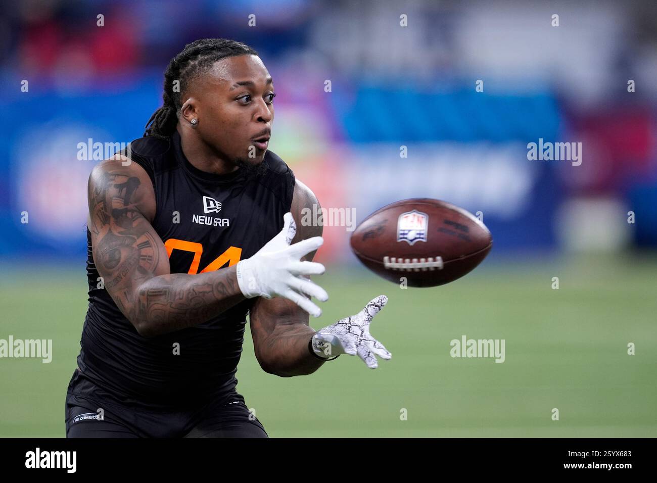 Texas Tech running back Tahj Brooks runs a drill at the NFL football