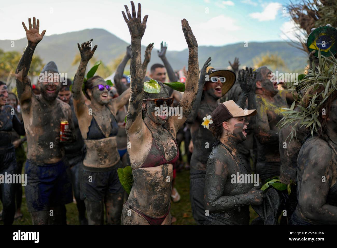Revelers Attend The Mud Block Carnival Party In Paraty Brazil revelers-attend-the-mud-block-carnival-party-in-paraty-brazil