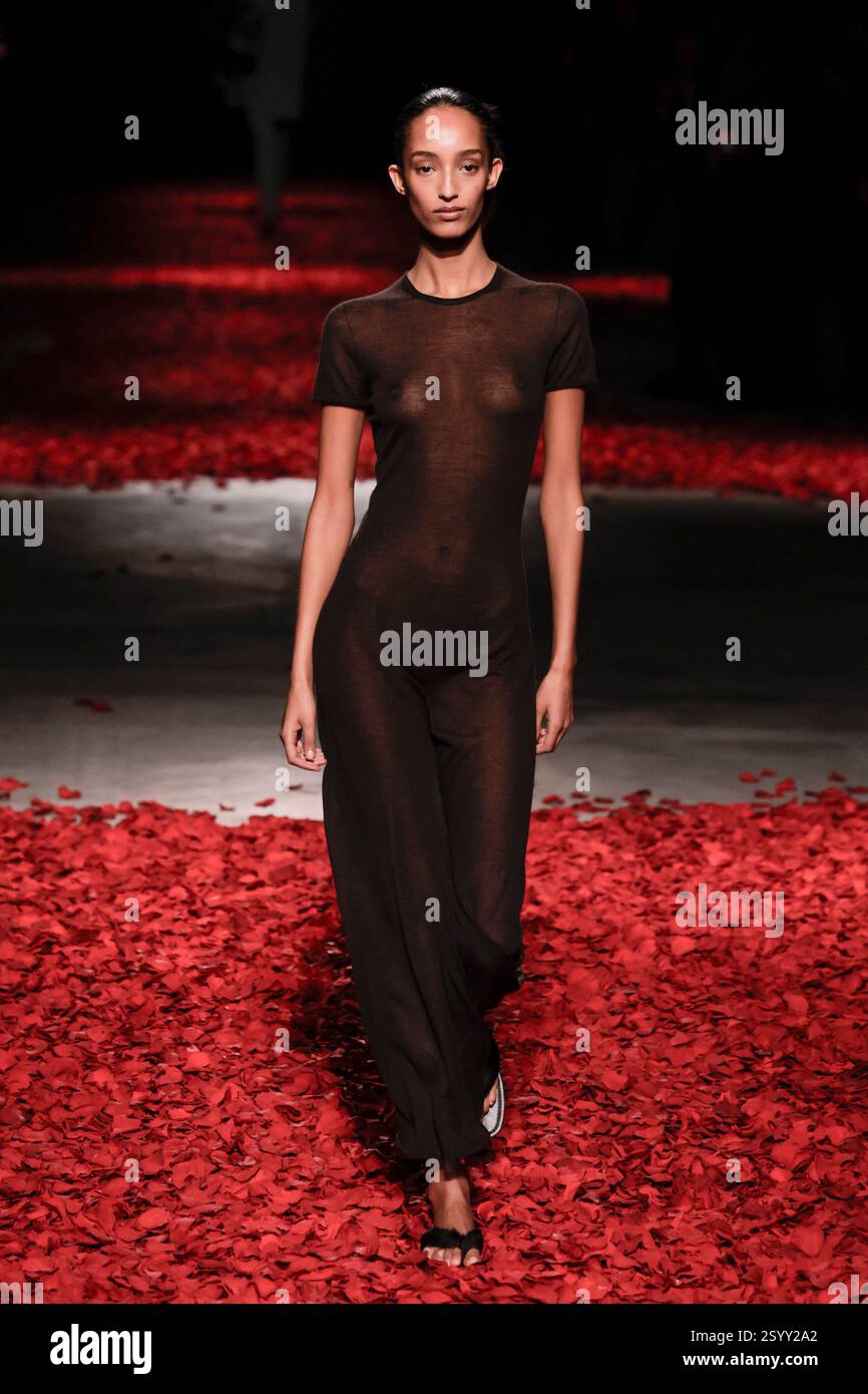 Model Mona Tougaard walks on the runway during the Versace Ready to