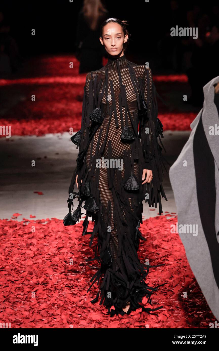 Milan, Italy. 28th Feb, 2025. Model Mona Tougaard walks on the runway