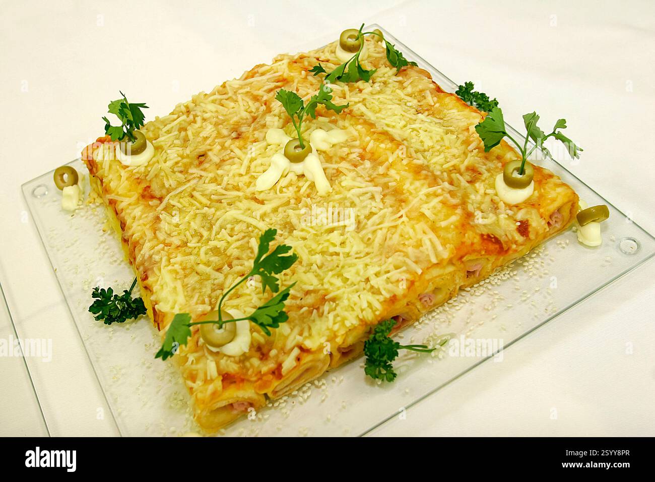 square pizza on glass tray on white background Stock Photo - Alamy