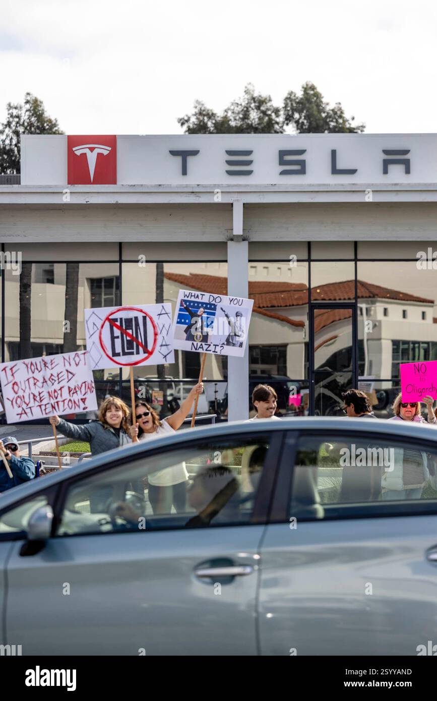 Santa Barbara protesters gather at the Tesla Dealership of Elon Musk in ...