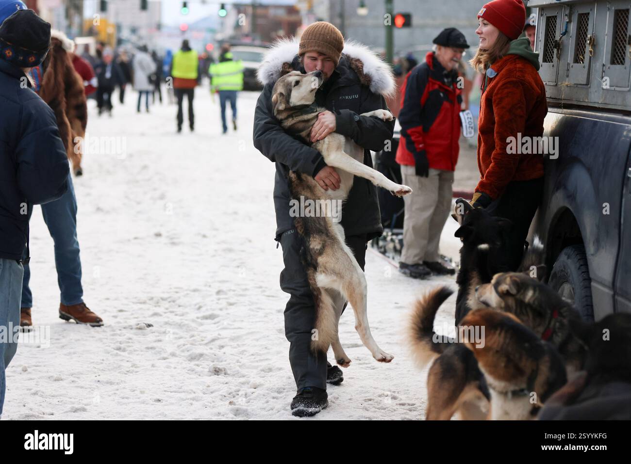 Riley Dyche (17), of Big Lake, Alaska, kisses his sled dog Redoubt ...